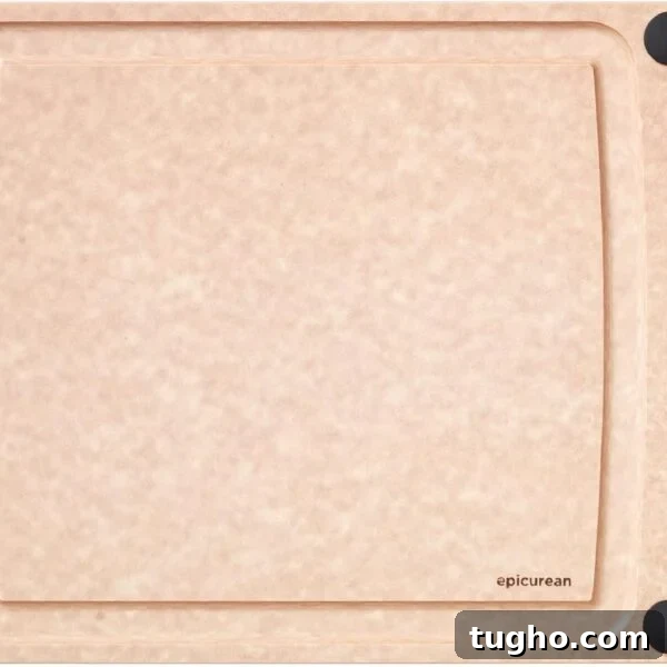 A rectangular, light brown cutting board with a smooth surface.