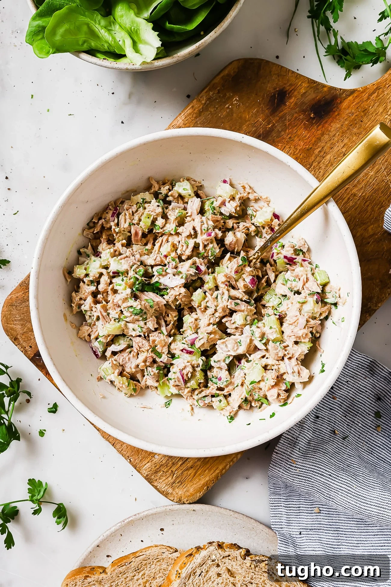 18 Pantry Recipes for Quick, Flavorful Meals 4 Overhead view of tuna salad in a white bowl.