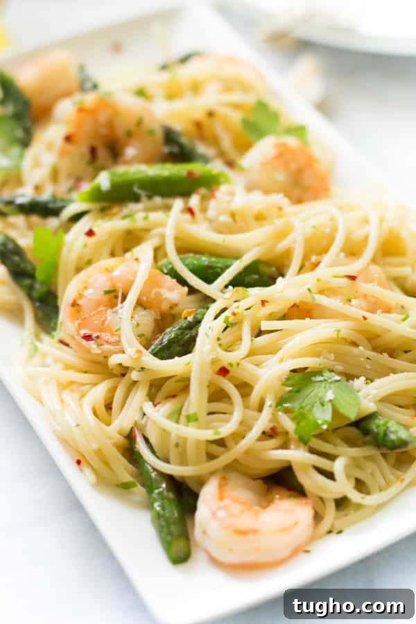 18 Pantry Recipes for Quick, Flavorful Meals 5 close up view of garlic shrimp spaghetti on a serving dish.
