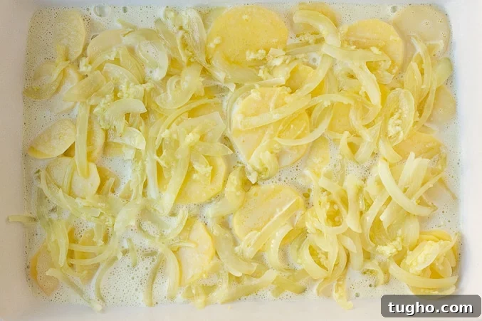 layered potatoes with onions and garlic