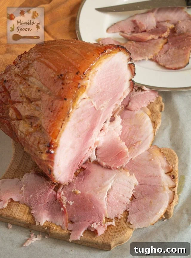 Cooked ham with slices.