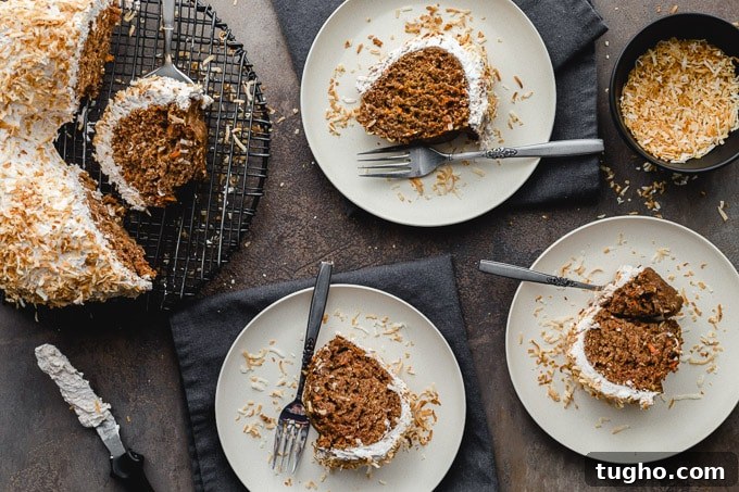 Dairy-Free, Eggless Coconut Carrot Cake Recipe 7 Slices of cake arranged on white plates with forks.