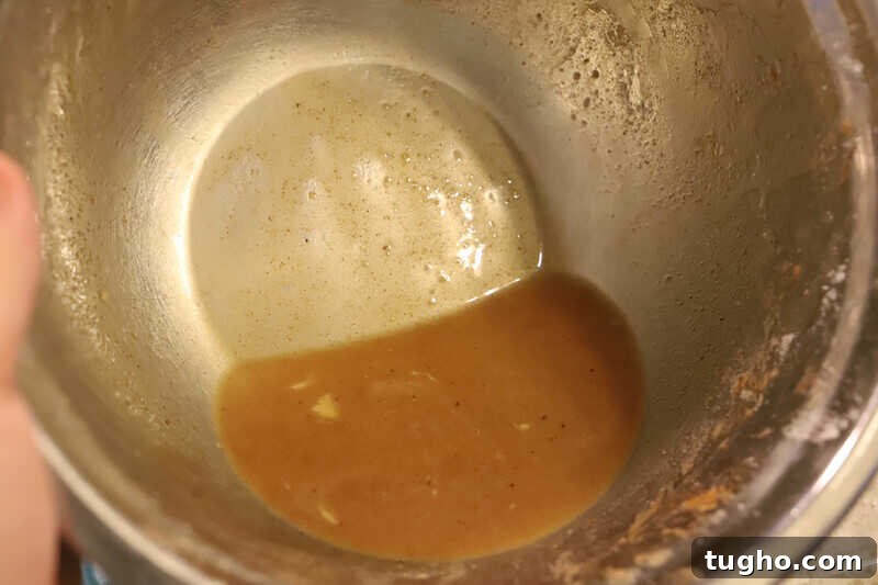 Caramel Dutch Apple Pie Recipe 4 leftover juice in a mixing bowl