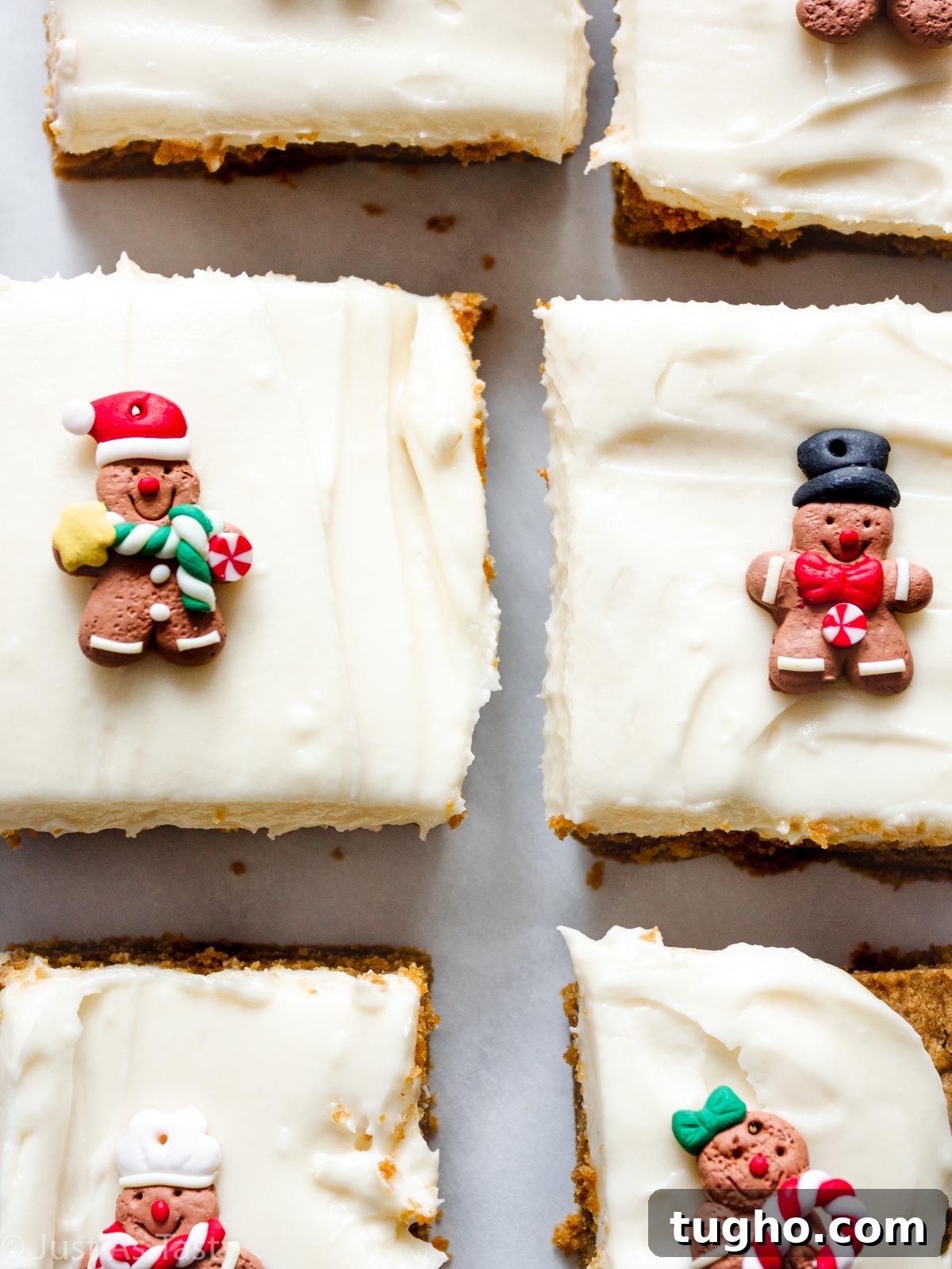 Soft, Chewy Gingerbread Bars with Cream Cheese Frosting 2 Close-up of gingerbread bars topped with cream cheese frosting.