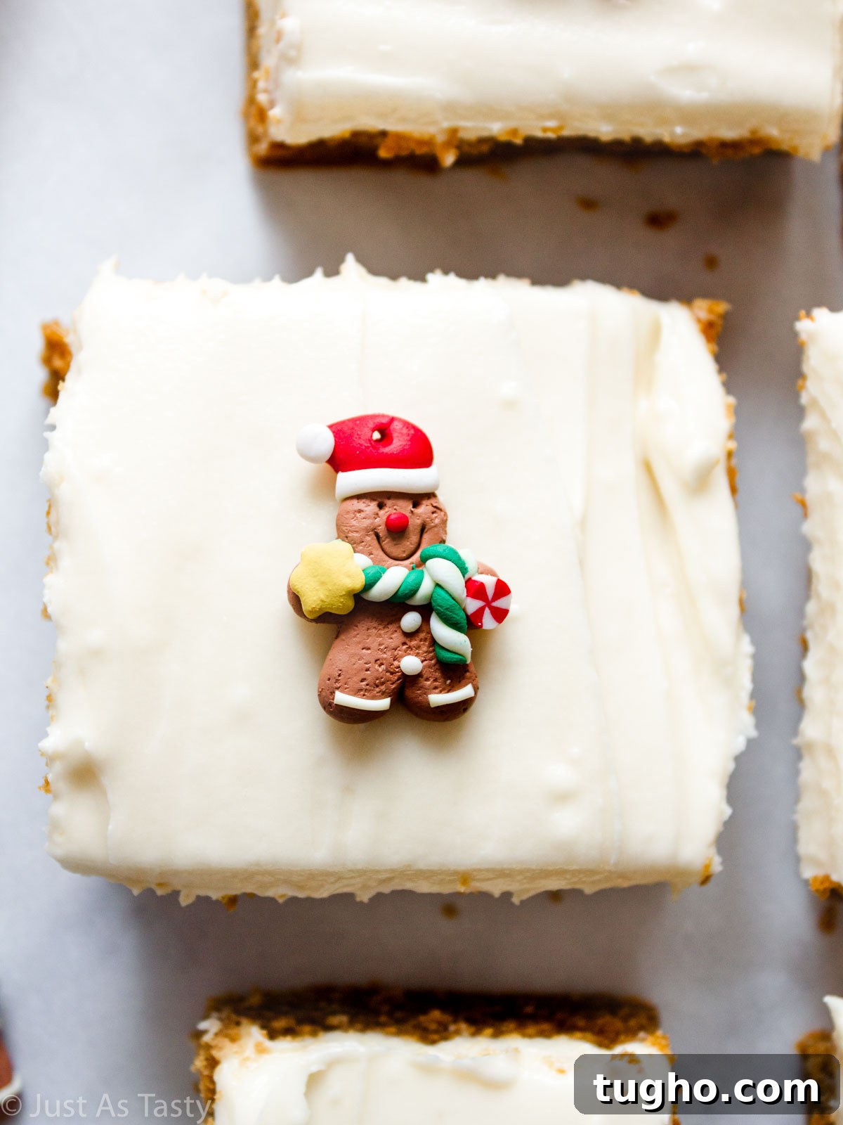 Soft, Chewy Gingerbread Bars with Cream Cheese Frosting 4 Gingerbread bar topped with cream cheese frosting.