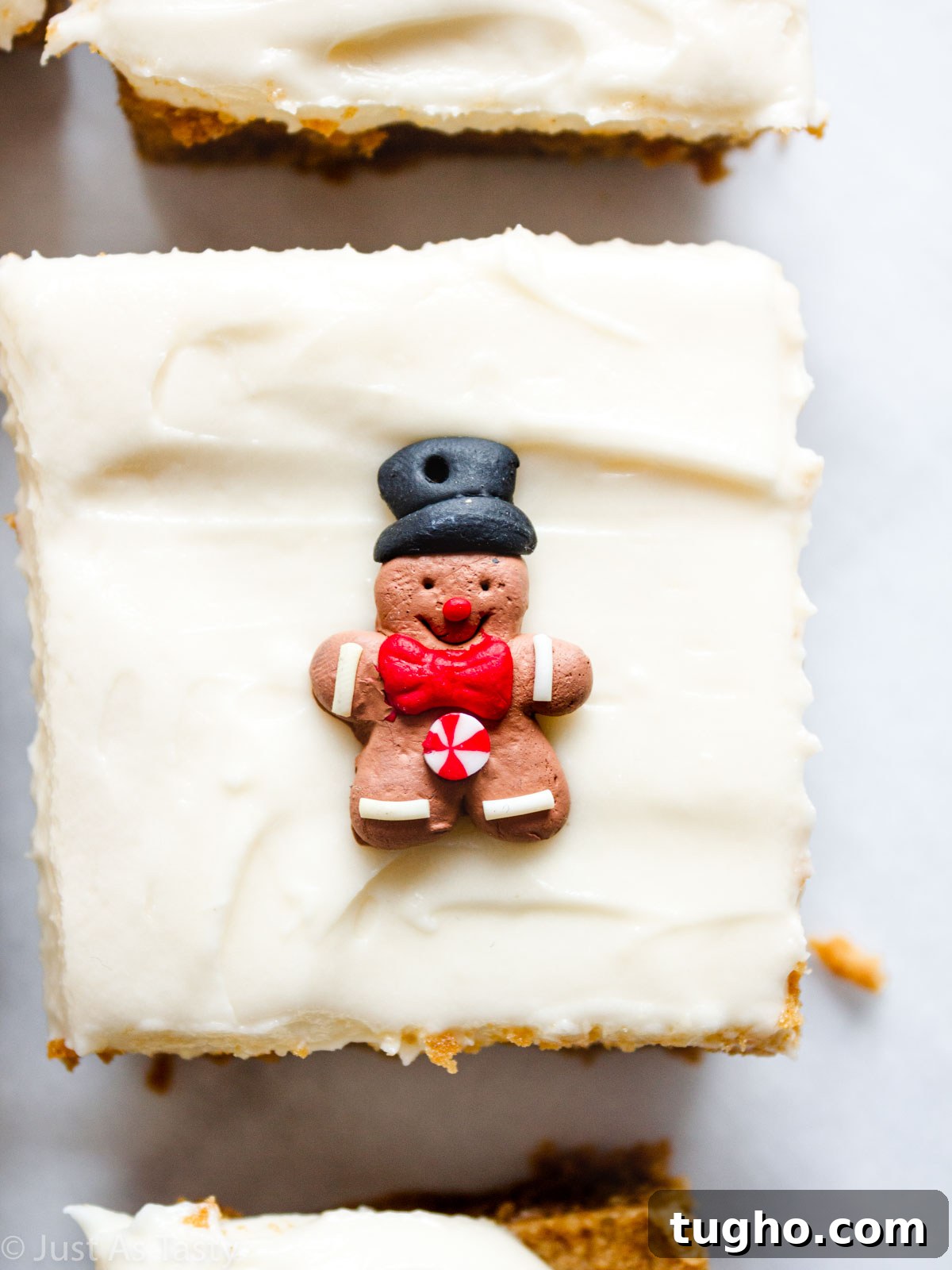 Soft, Chewy Gingerbread Bars with Cream Cheese Frosting 6 Gingerbread bar topped with cream cheese frosting.