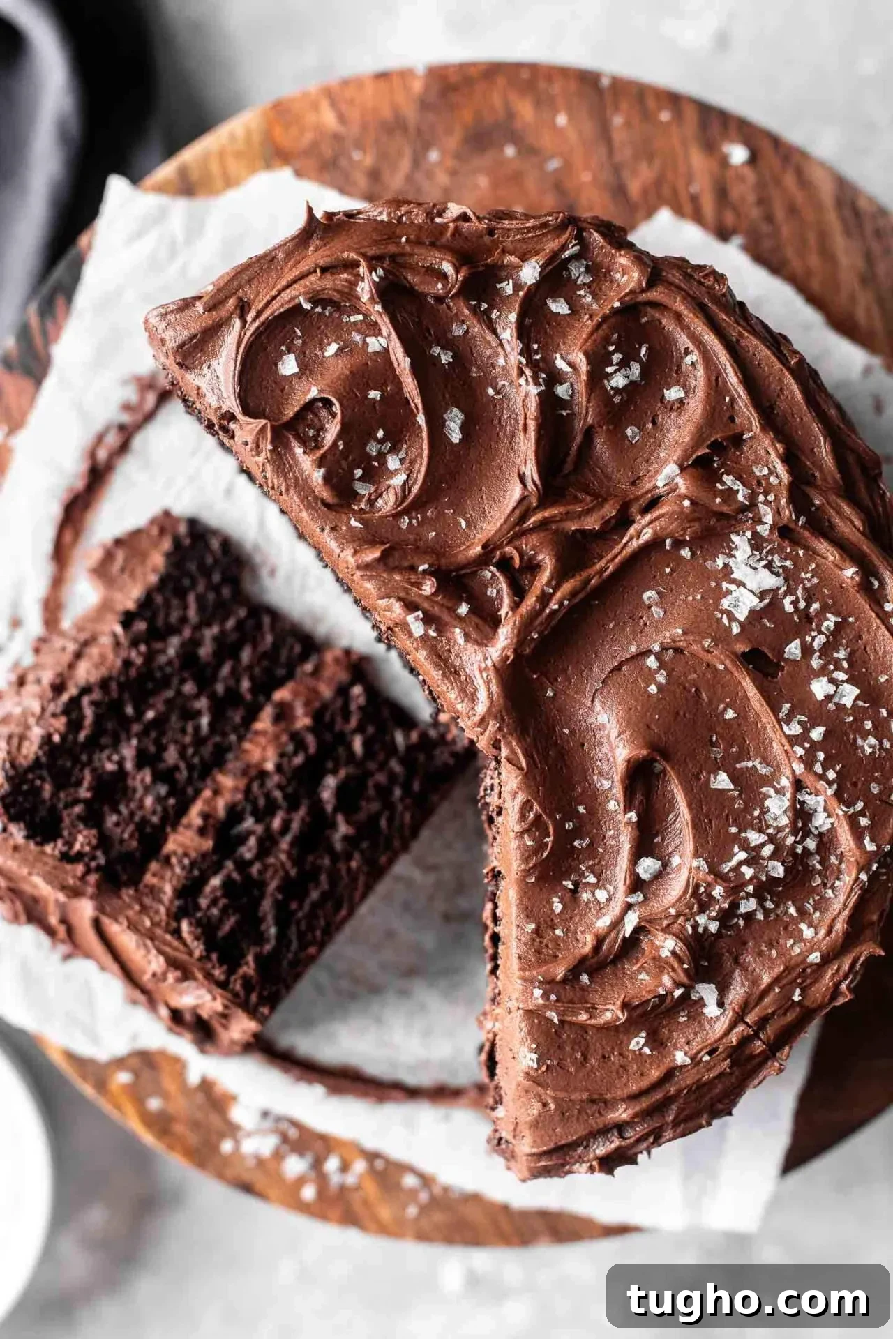Fudgy Gluten Free Chocolate Cake Recipe 10 sliced gluten free chocolate cake on cake stand