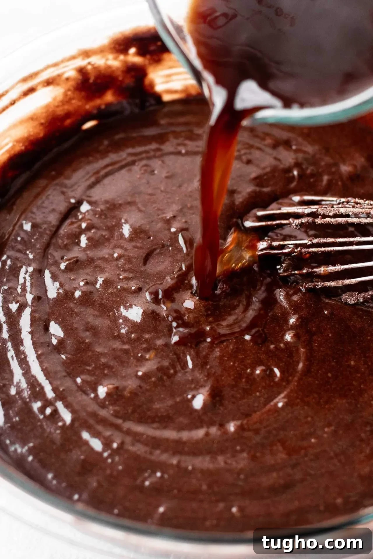 Fudgy Gluten Free Chocolate Cake Recipe 6 gluten free chocolate cake batter with hot coffee being poured in