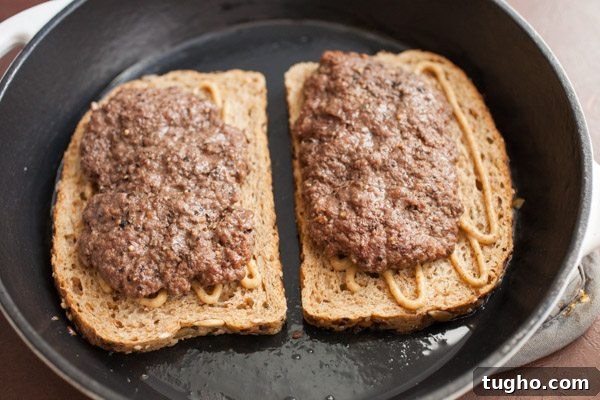 Crispy Bacon and Swiss Patty Melt Recipe 4 Bacon Swiss Patty Melts - recipe from RecipeGirl.com