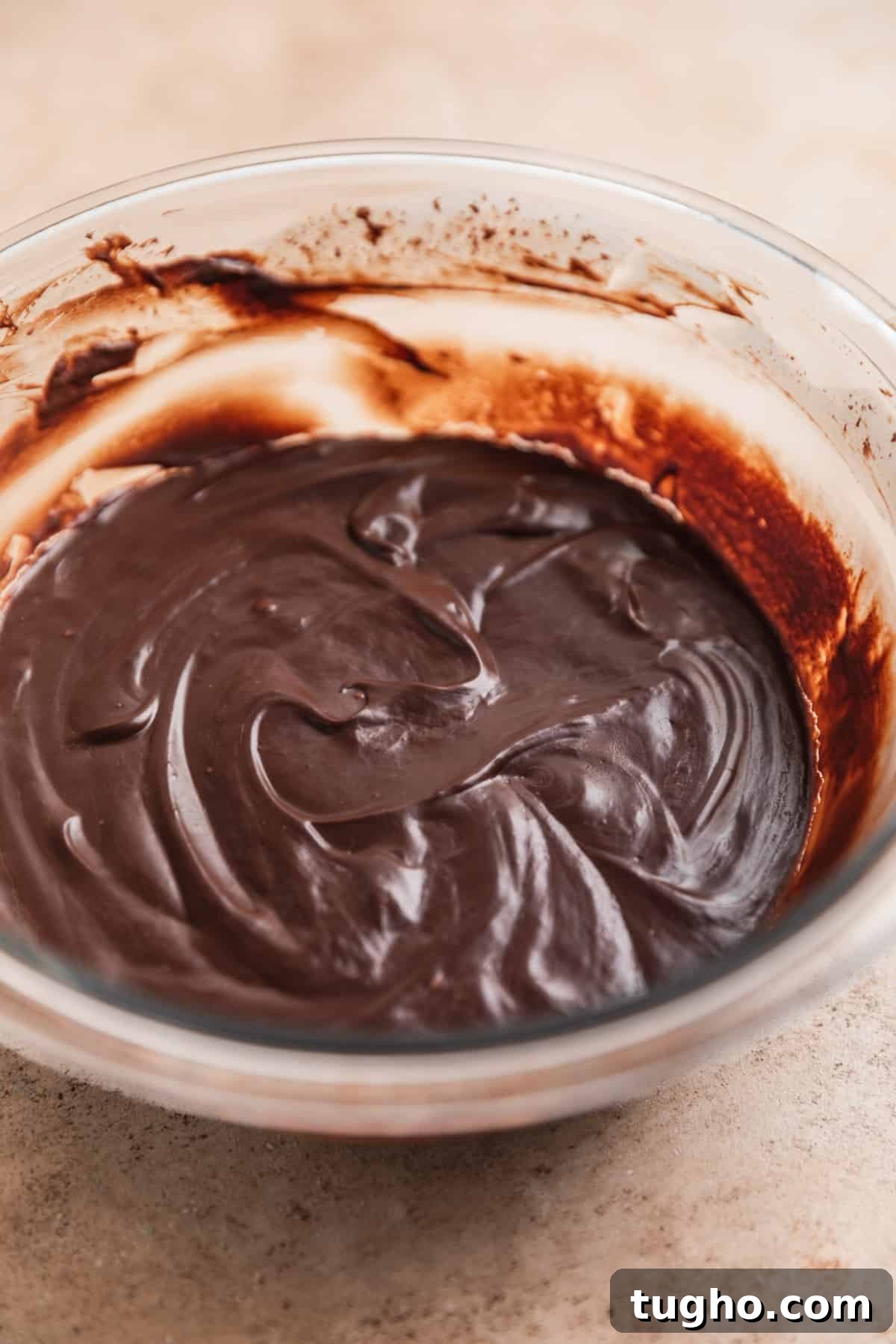Hardened chocolate ganache in mixing bowl.