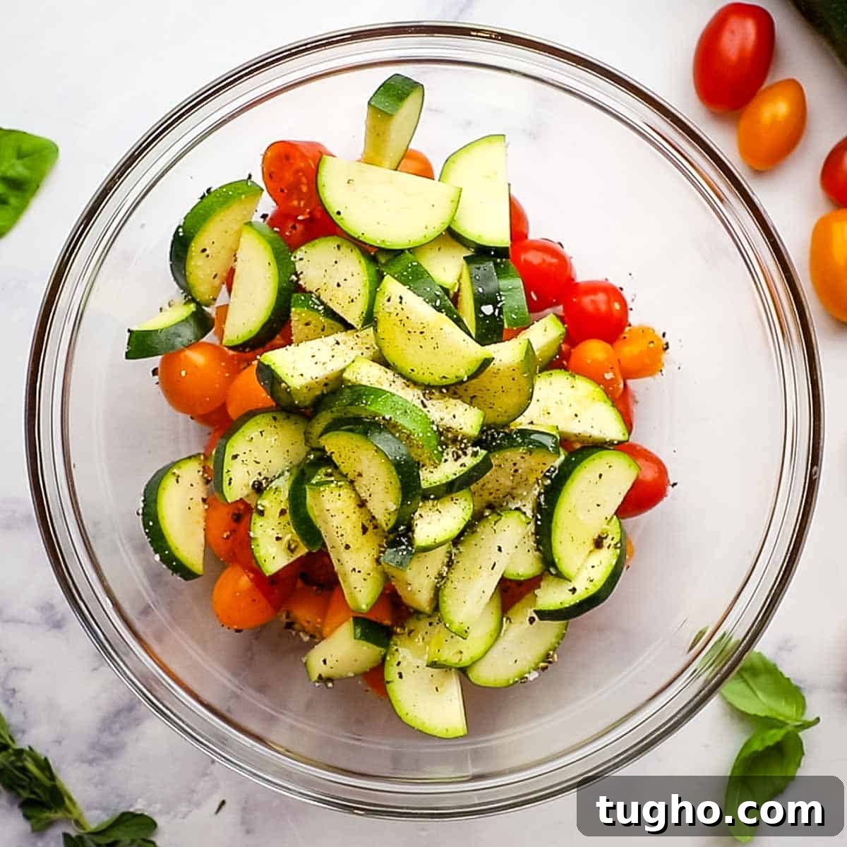 zucchini and tomato in a bowl
