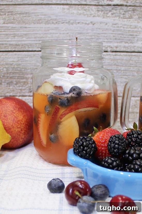 Fresh fruits of summer served in a glass with gelatin.
