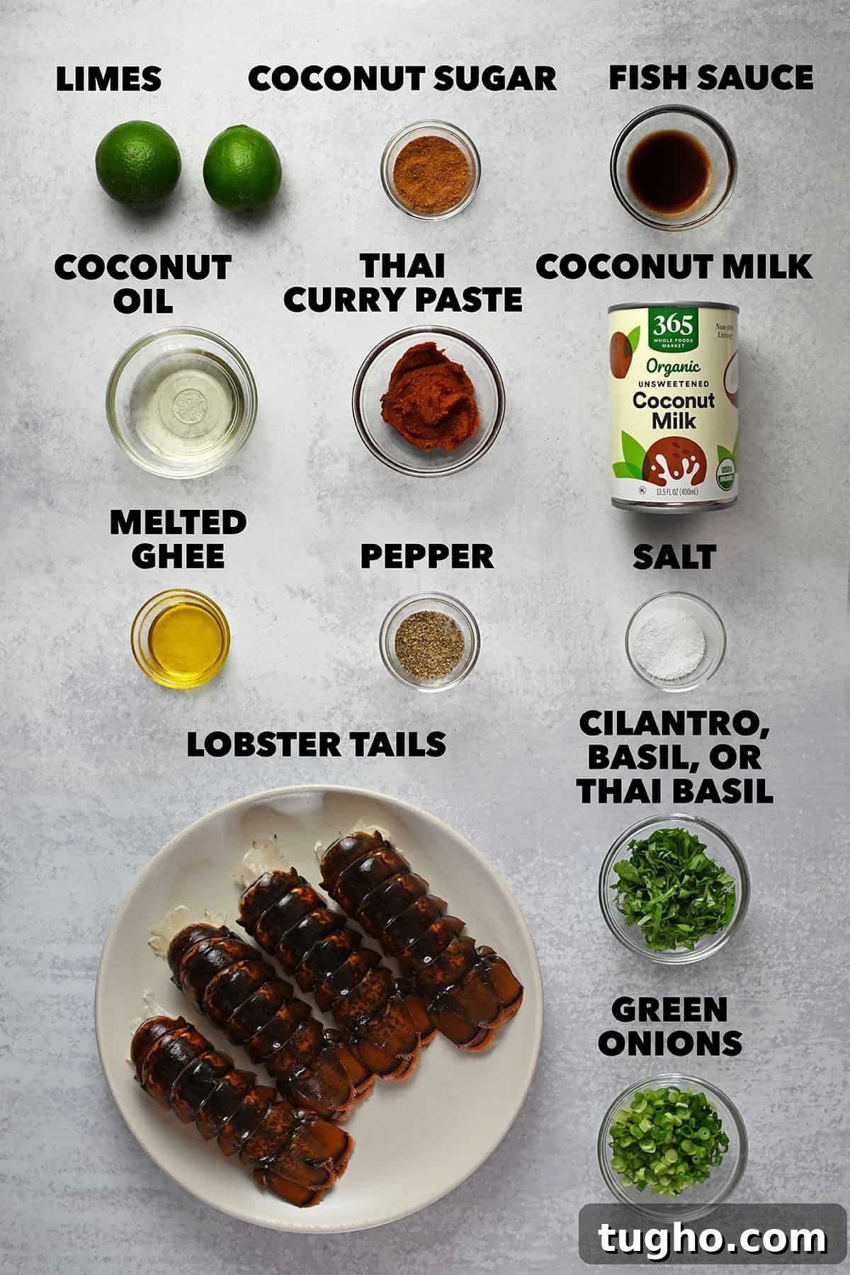 An overhead shot of the raw ingredients needed to make baked lobster tails or air fryer lobster tails with Thai red curry sauce.