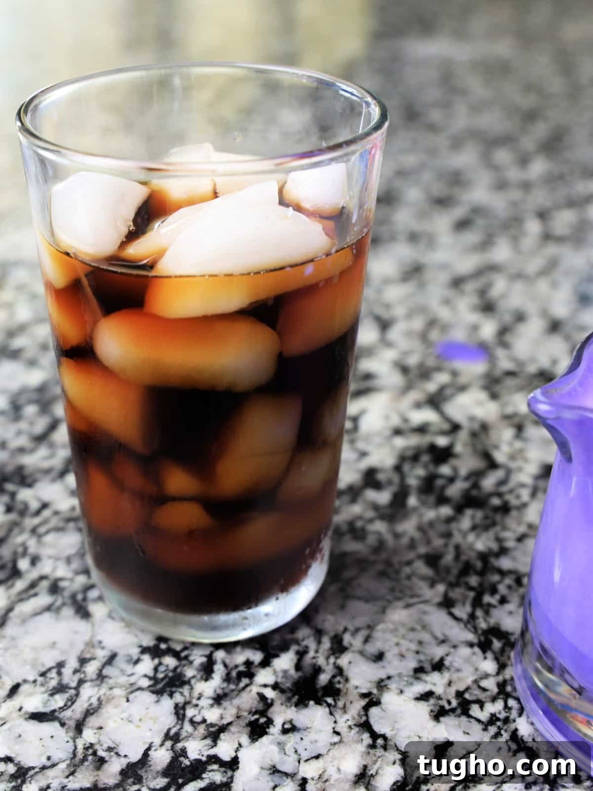pour cold coffee over ice