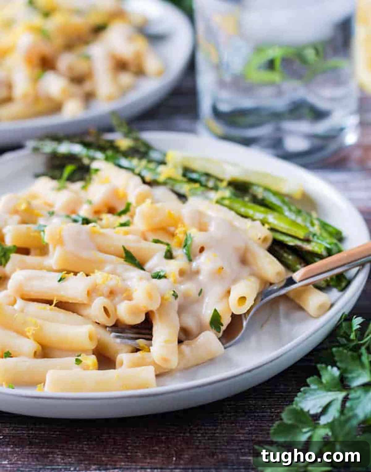 Fork scooping up a bite of pasta.