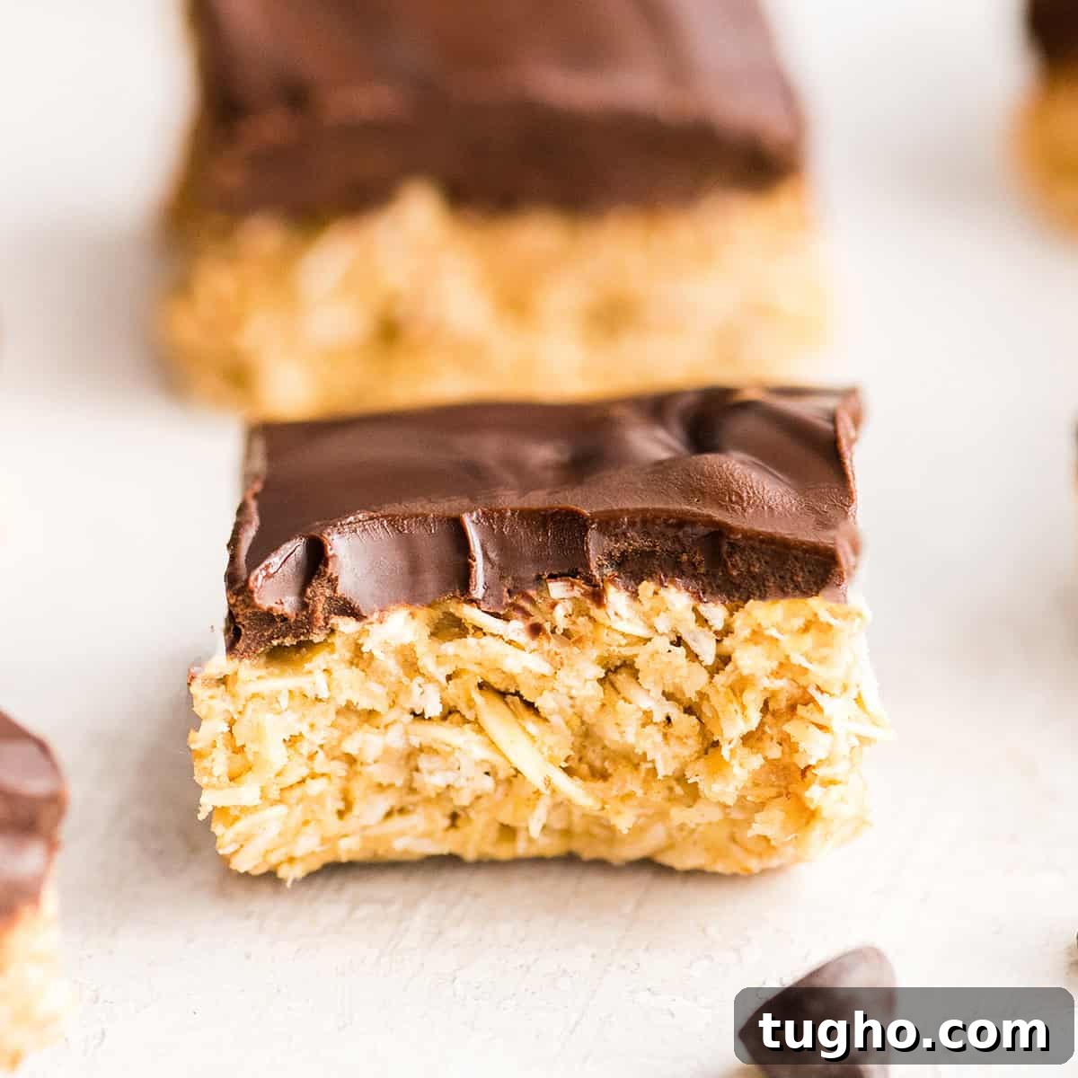 Chewy No-Bake Oatmeal Bars Recipe 5 one No Bake Oatmeal Bar with a bite taken out of it