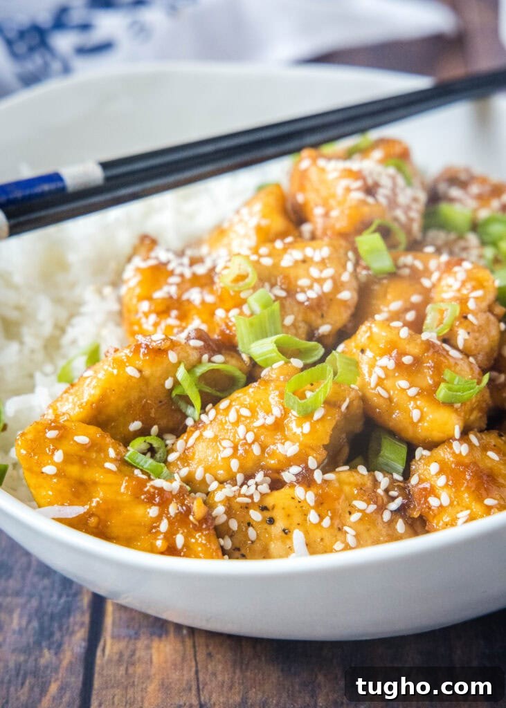 bourbon chicken in a white bowl