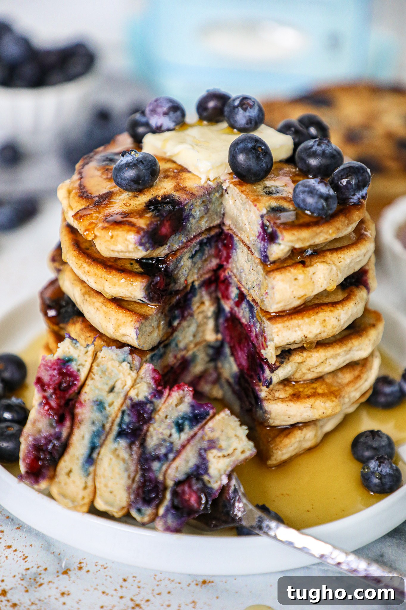 Fluffy Blueberry Vanilla Pancakes Recipe 4 Warm buttery blueberry pancakes loaded with tart blueberries and perfect for breakfast.