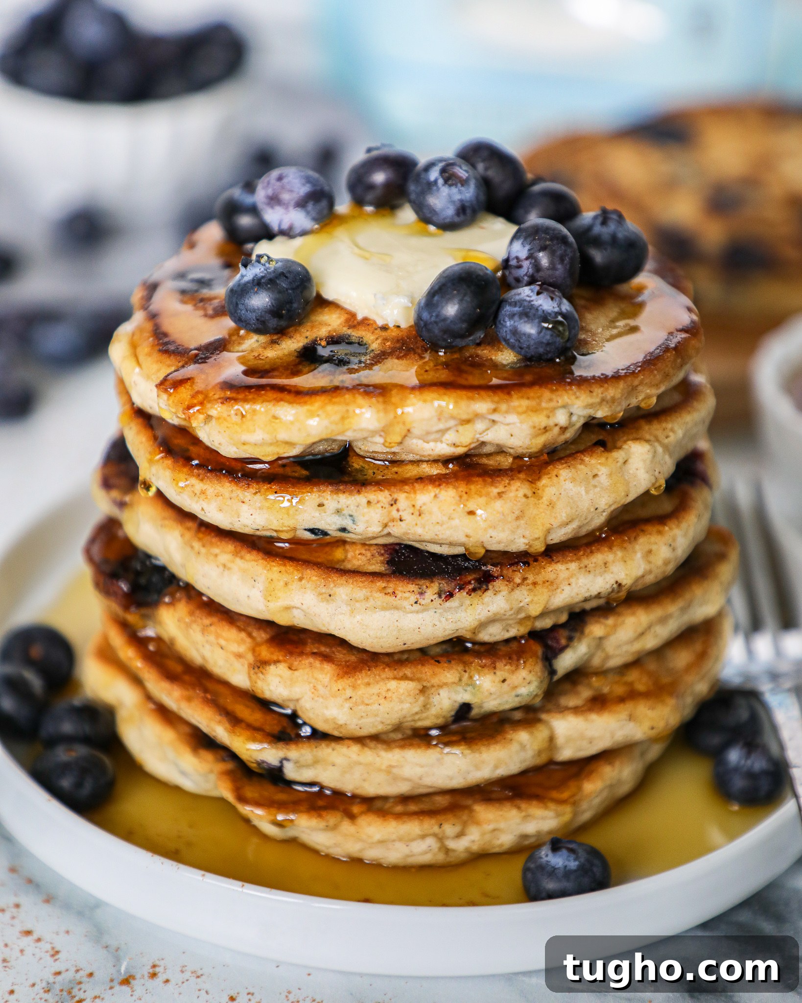 Fluffy Blueberry Vanilla Pancakes Recipe 6 Warm, delicious blueberry pancakes that are soft, fluffy, and perfect for breakfast.