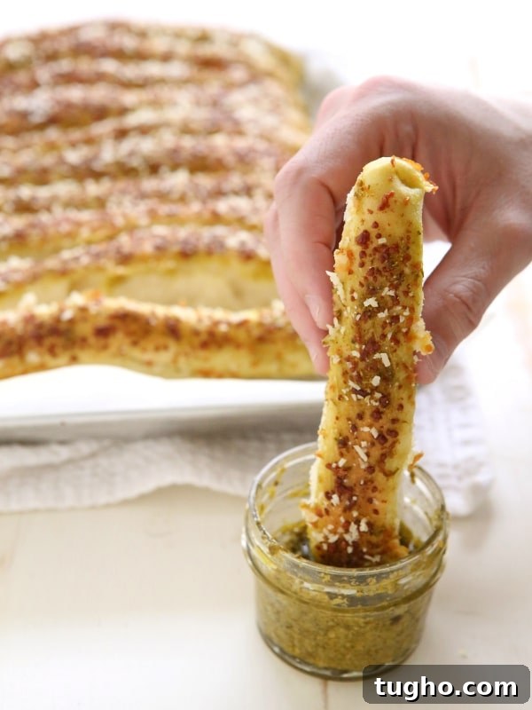 Pesto Parmesan Pull Apart Breadsticks Recipe 7 Pesto Parmesan Pull Apart Breadsticks | completelydelicious.com