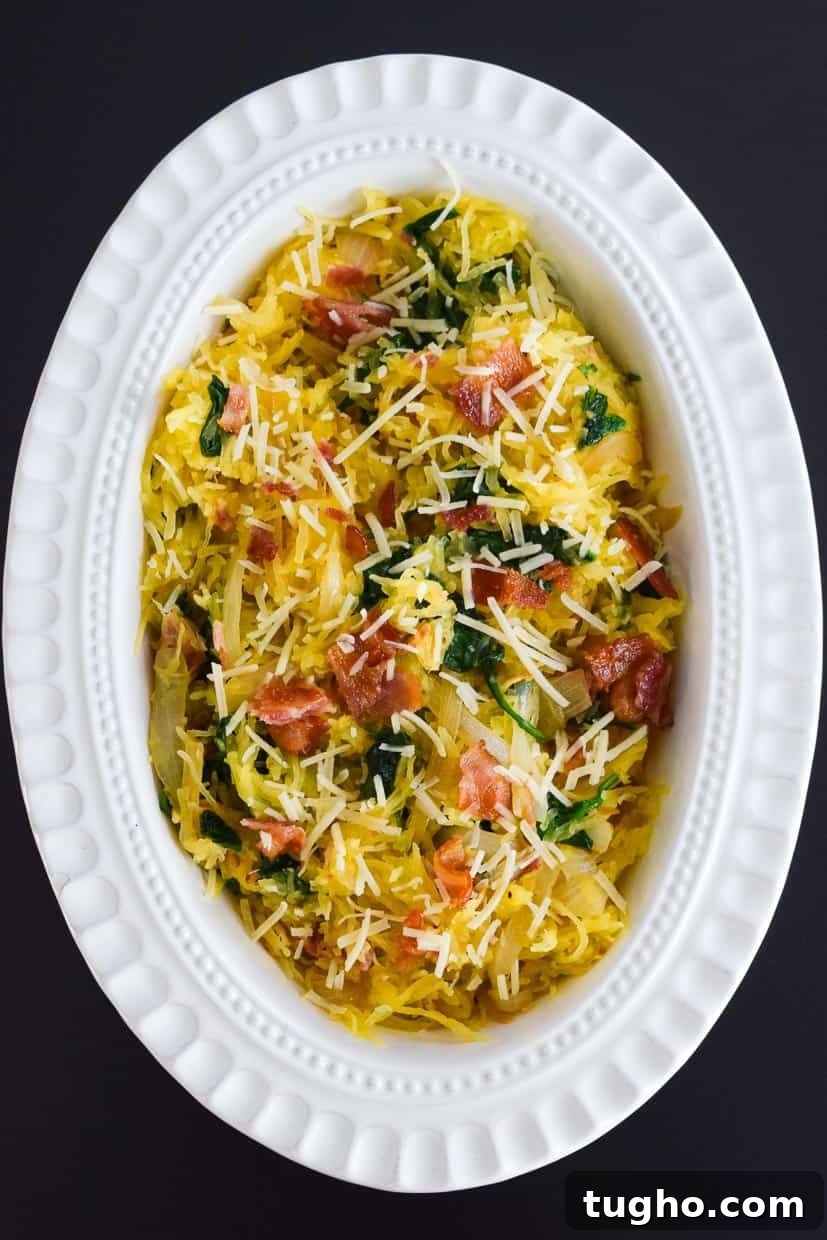 Spaghetti Squash Florentine Recipe with Spinach and Parmesan 3 Spaghetti Squash Florentine in white bowl overhead shot