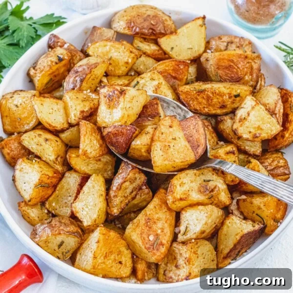 roasted potatoes and a silver spoon