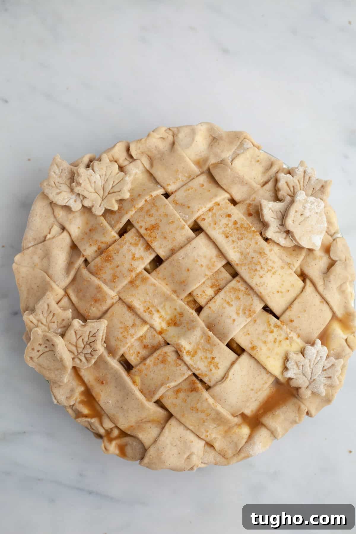 An unbaked lattice covered pie