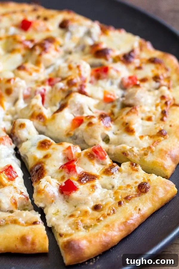 Creamy Chicken Alfredo Pizza Recipe 2 Tips and tricks for delicious thin crust pizza with creamy cheesy chicken alfredo topping.