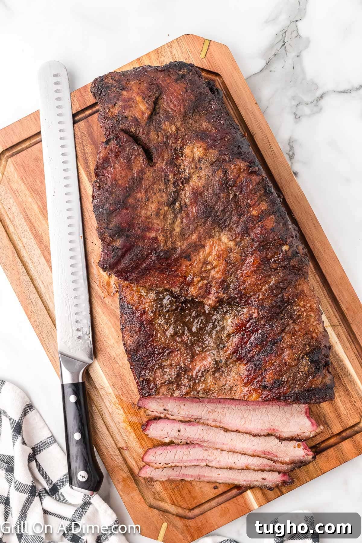 Authentic Texas Style Brisket Recipe 11 Slicing the cooled brisket on the cutting board