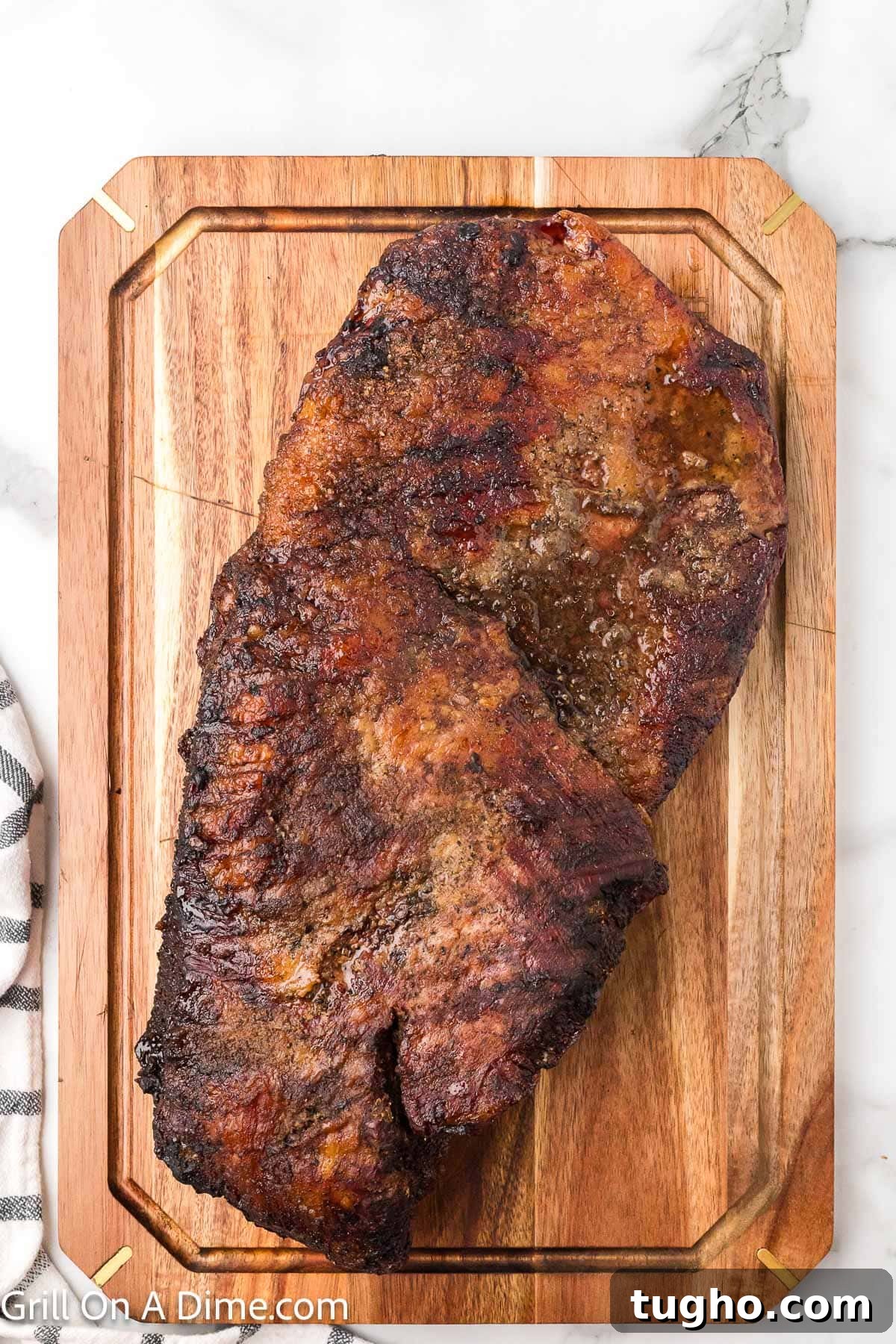 Authentic Texas Style Brisket Recipe 10 Smoked brisket on the cutting board