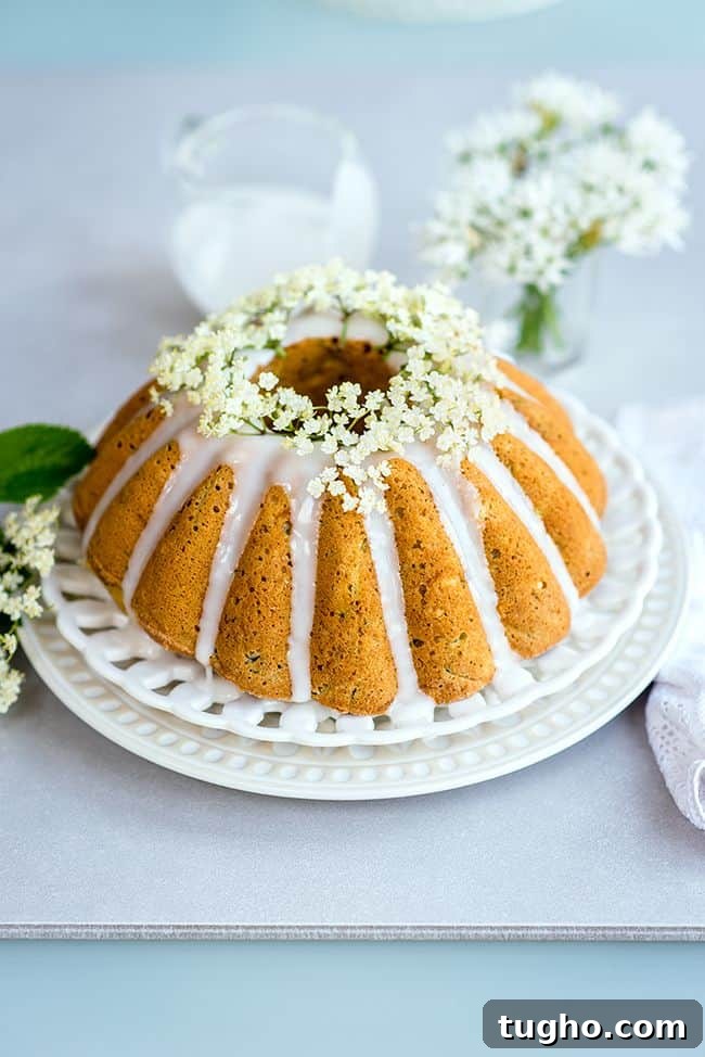 Wonderfully moist zucchini coconut bundt cake with elderflower glaze. Can be baked as a bundt or small loaf cake and it's great for breakfast or snacking.