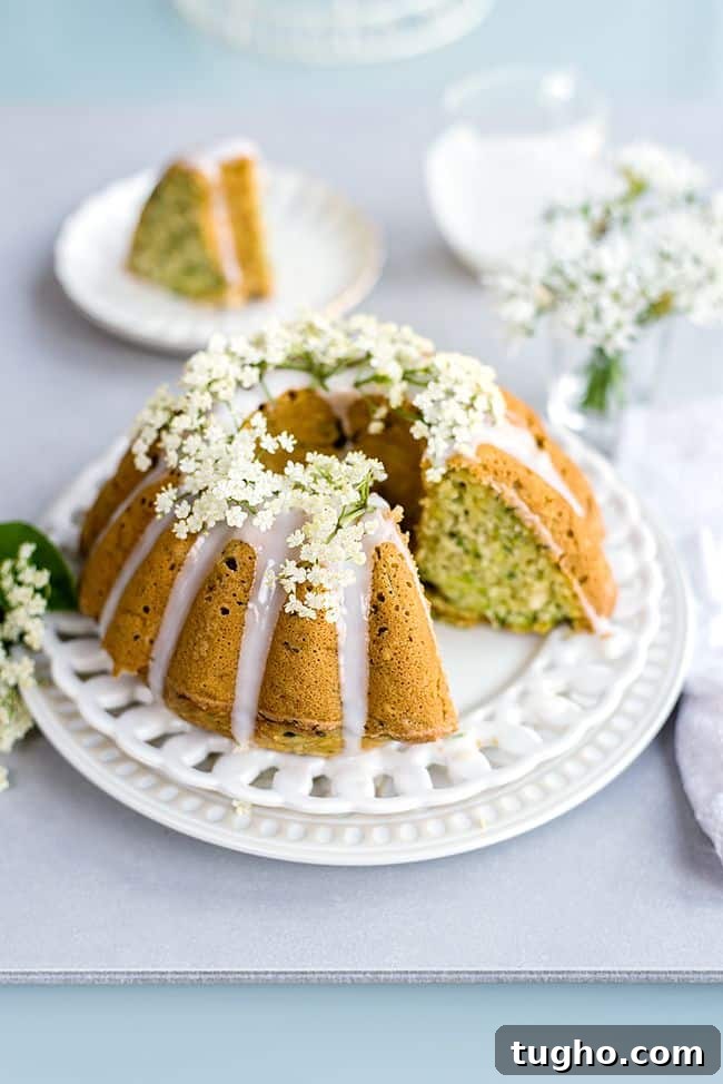 Wonderfully moist zucchini coconut bundt cake with elderflower glaze. Can be baked as a bundt or small loaf cake and it's great for breakfast or snacking.