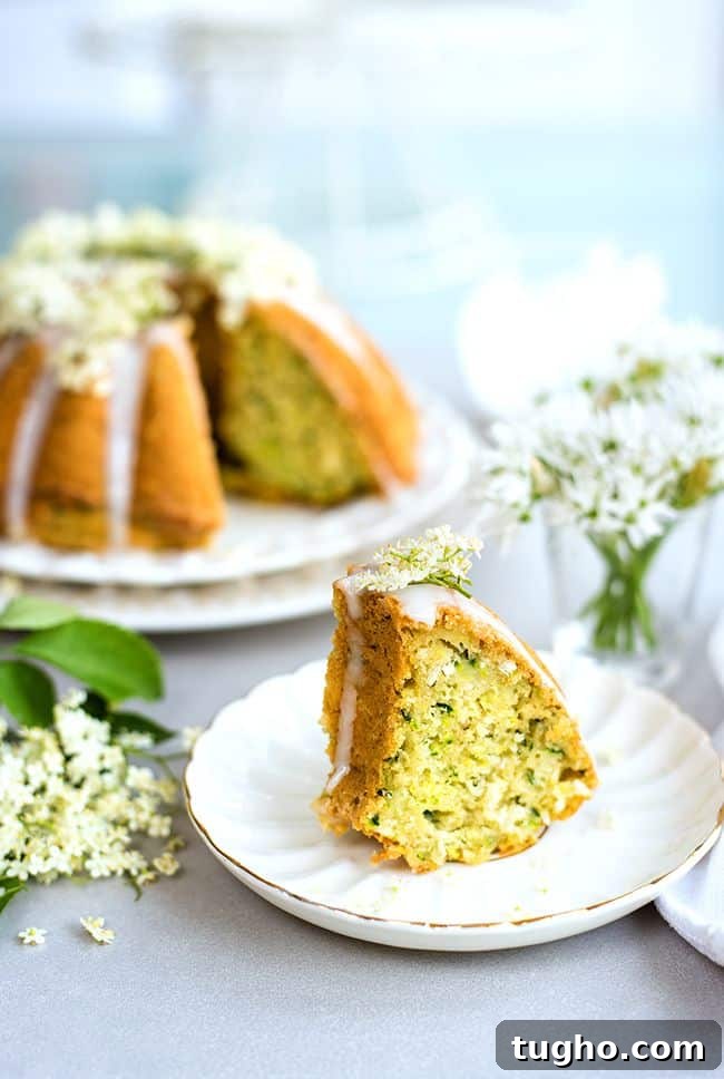 Wonderfully moist zucchini coconut bundt cake with elderflower glaze. Can be baked as a bundt or small loaf cake and it's great for breakfast or snacking.