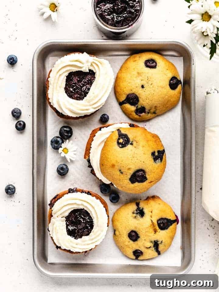 Blueberry Whoopie Pies Recipe: Soft Cream-Filled Treats 4 blueberry whoopee pies on a sheet tray