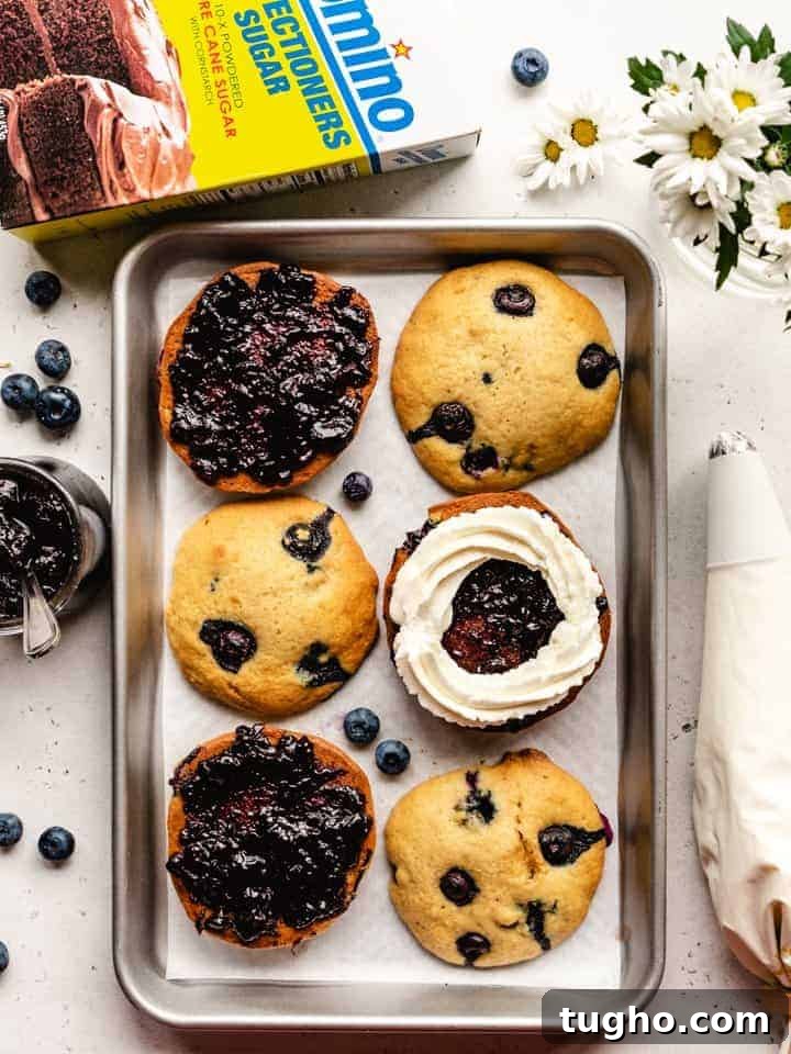 Blueberry Whoopie Pies Recipe: Soft Cream-Filled Treats 9 blueberry whoopee pies being assembled