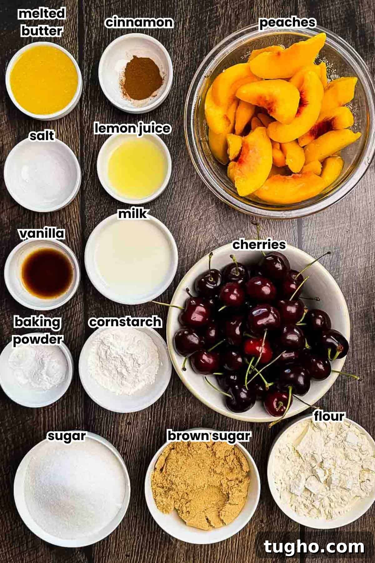 Homemade Cherry and Peach Cobbler Recipe 3 All of the ingredients for the peach cherry cobbler placed on a wooden table and labeled.