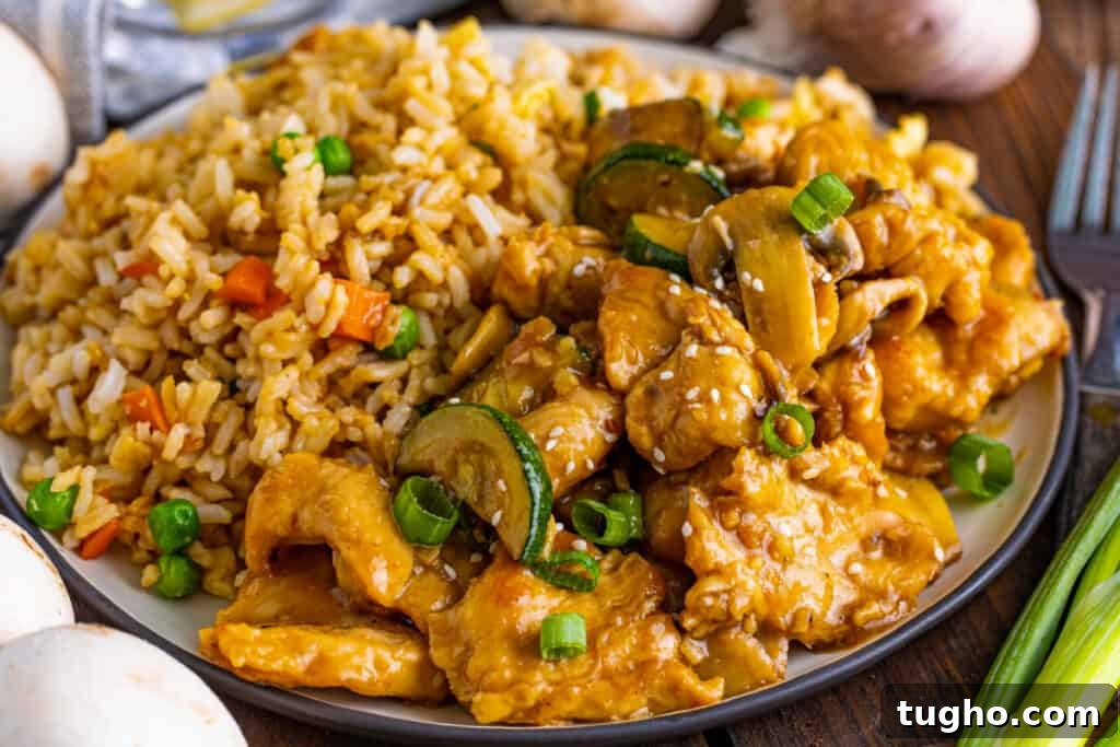 mushroom chicken recipe on plate with fried rice