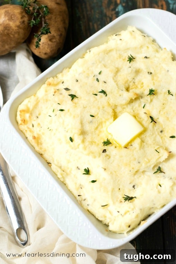 12 Sides That Pair Perfectly with Sloppy Joes 4 A casserole dish filled with cream cheese mashed potatoes.
