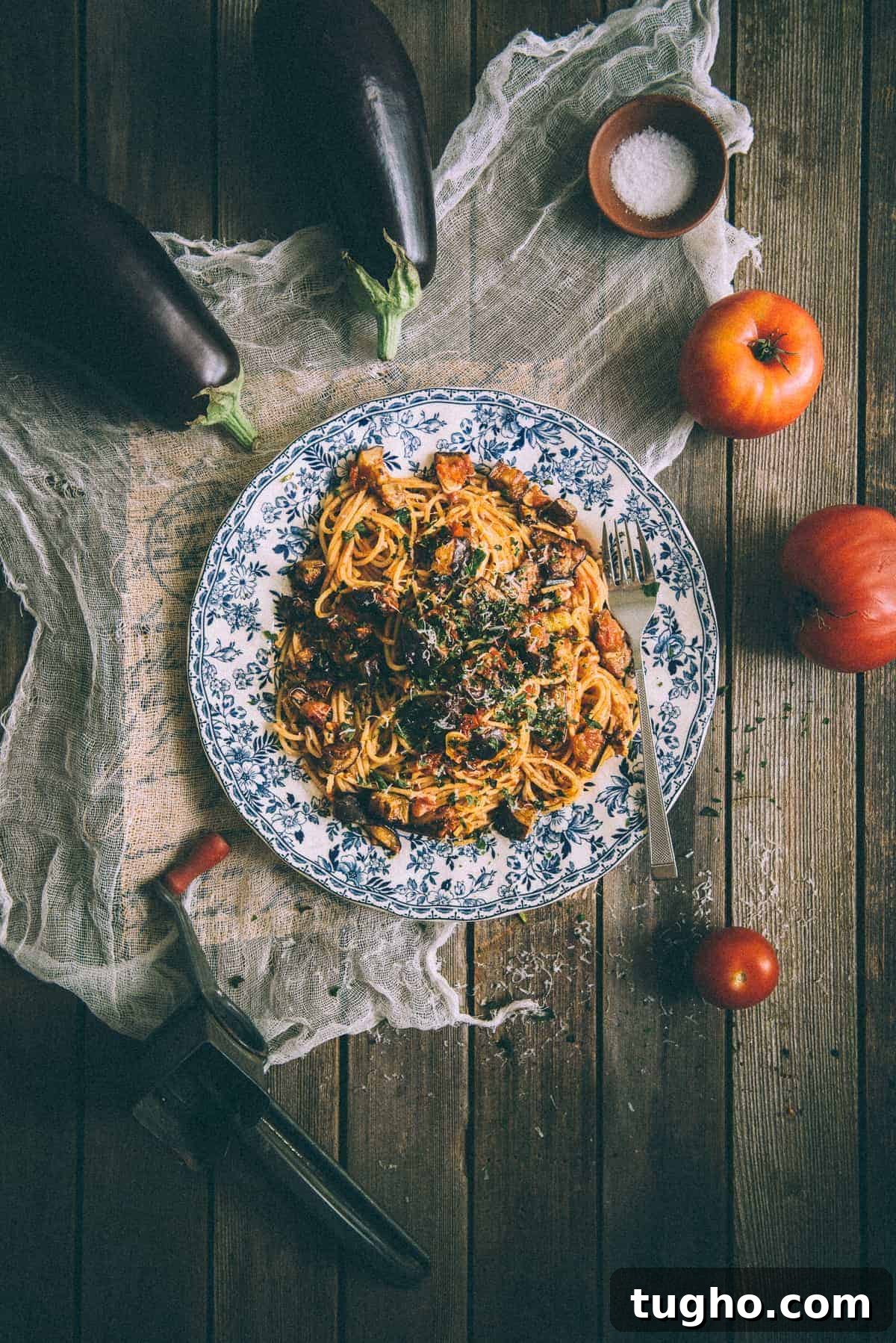 Pasta alla Norma with Eggplant and Ricotta Salata 6 pasta all norma made with eggplants and tomatoes served on a plate