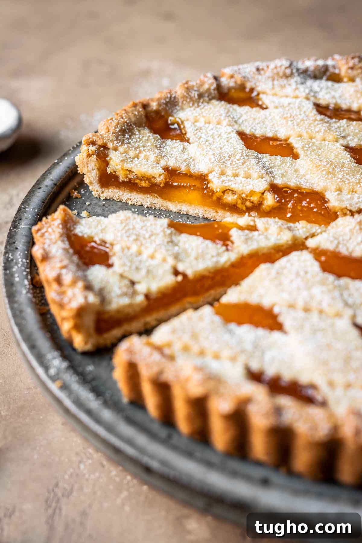 Classic Italian Jam Crostata Recipe 14 Sliced apricot jam tart.