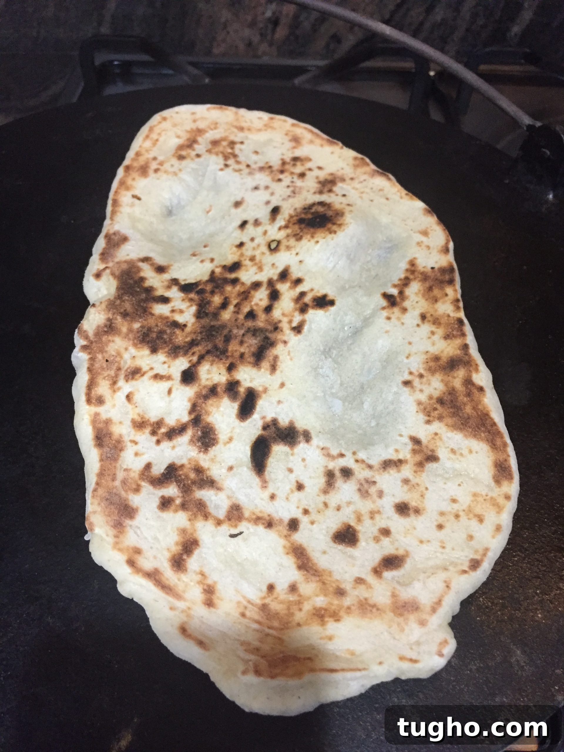 Flip naan over Flipping naan