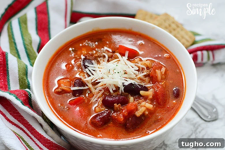 Instant Pot Stuffed Pepper Soup Recipe 2 Instant Pot Stuffed Pepper Soup in White Bowl Topped with Cheese