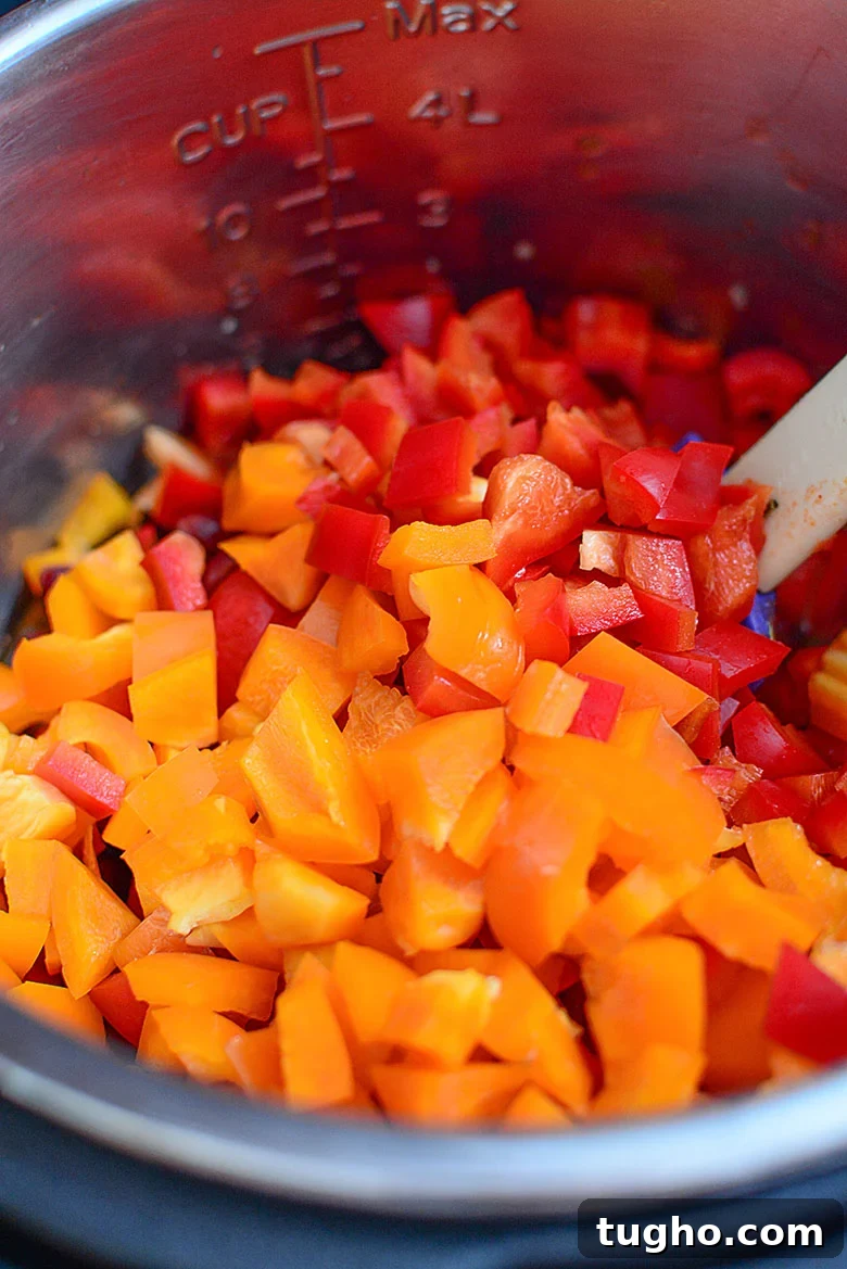 Instant Pot Stuffed Pepper Soup Recipe 6 Bell Peppers and Diced Tomatoes Added to Instant Pot