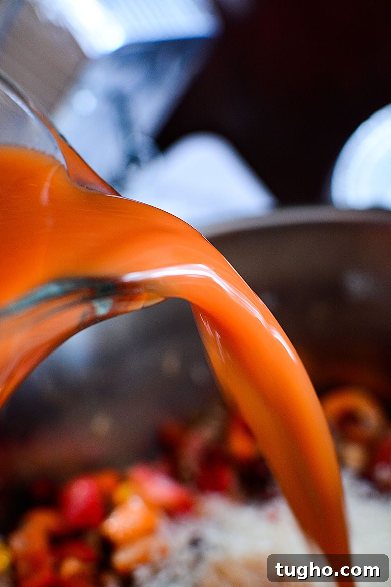Instant Pot Stuffed Pepper Soup Recipe 8 Pouring Beef Broth Into Instant Pot