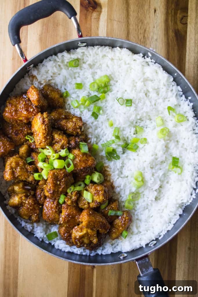 Sticky Sweet and Spicy Chicken Rice Bowls in 30 Minutes 3 Sticky sweet and spicy chicken served over rice