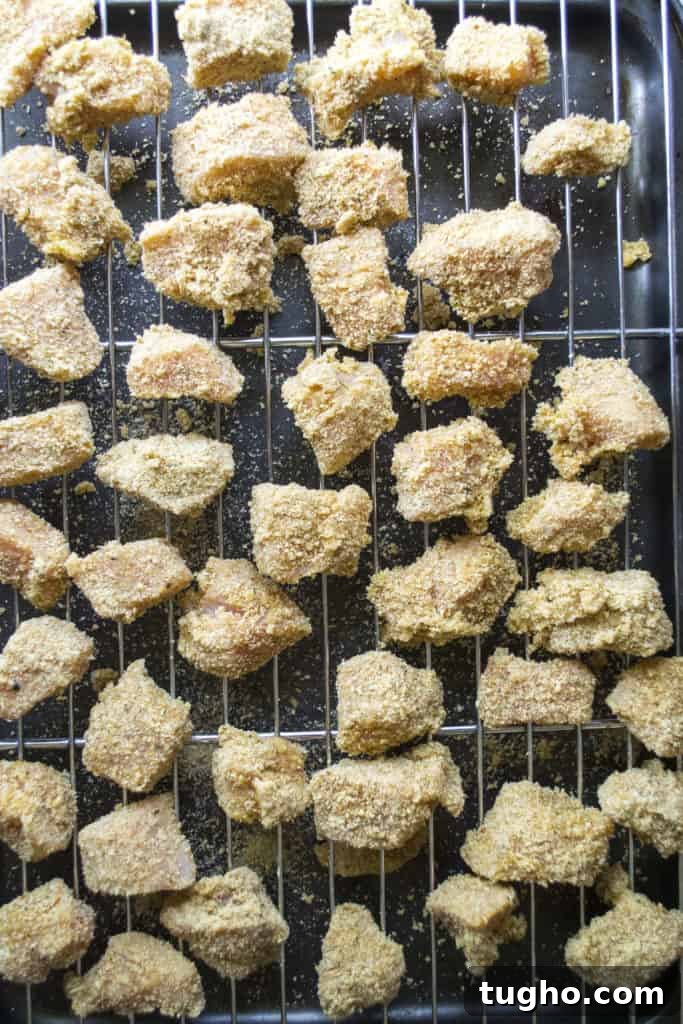 Sticky Sweet and Spicy Chicken Rice Bowls in 30 Minutes 5 Baked chicken bites for sticky sweet and spicy chicken
