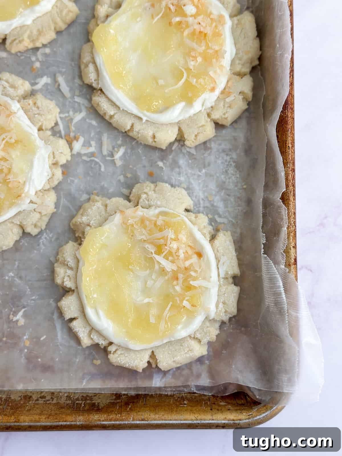 A pina colada cookie on a cookie sheet.