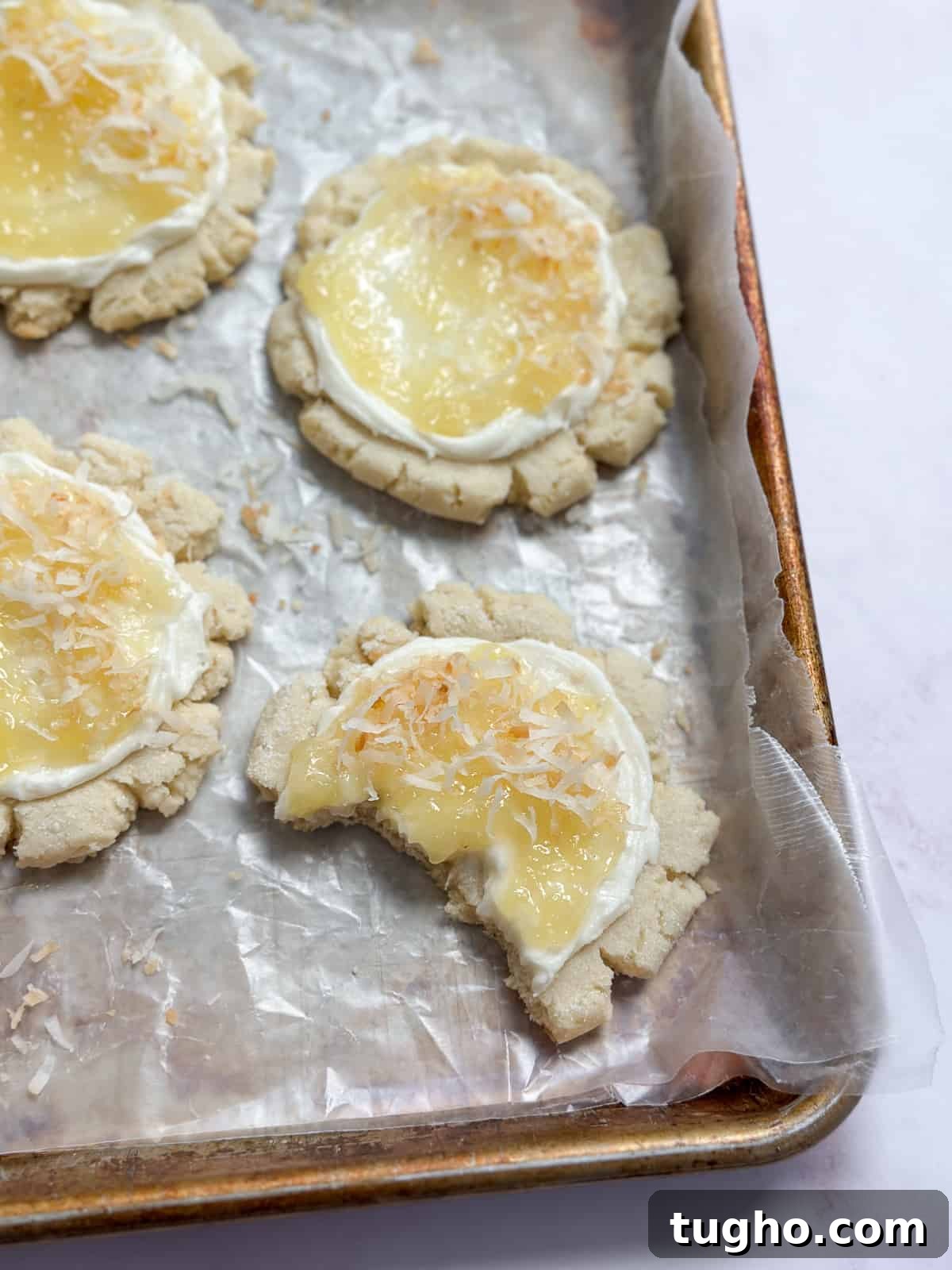 a pina colada cookie broken in half.