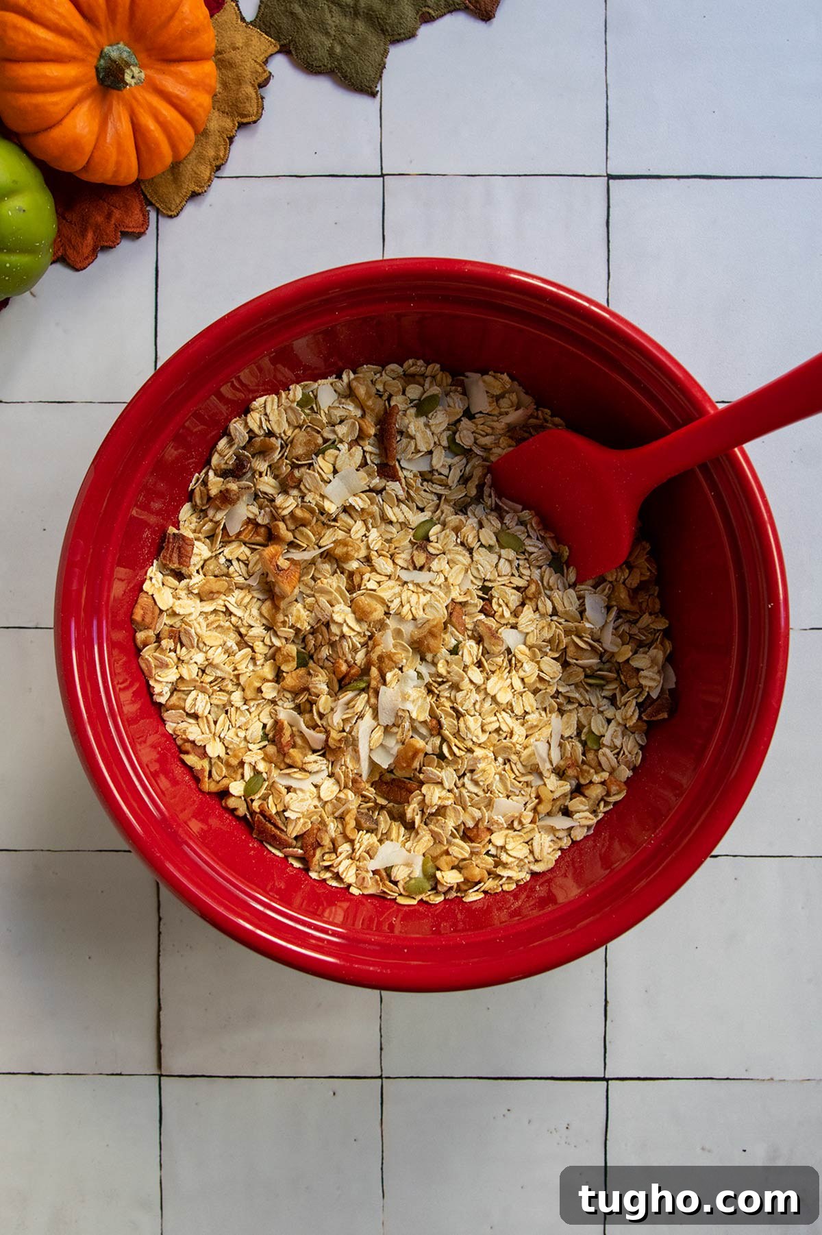 Pumpkin Granola Recipe with Maple or Date Syrup 4 Dry ingredients mixed in a bowl.