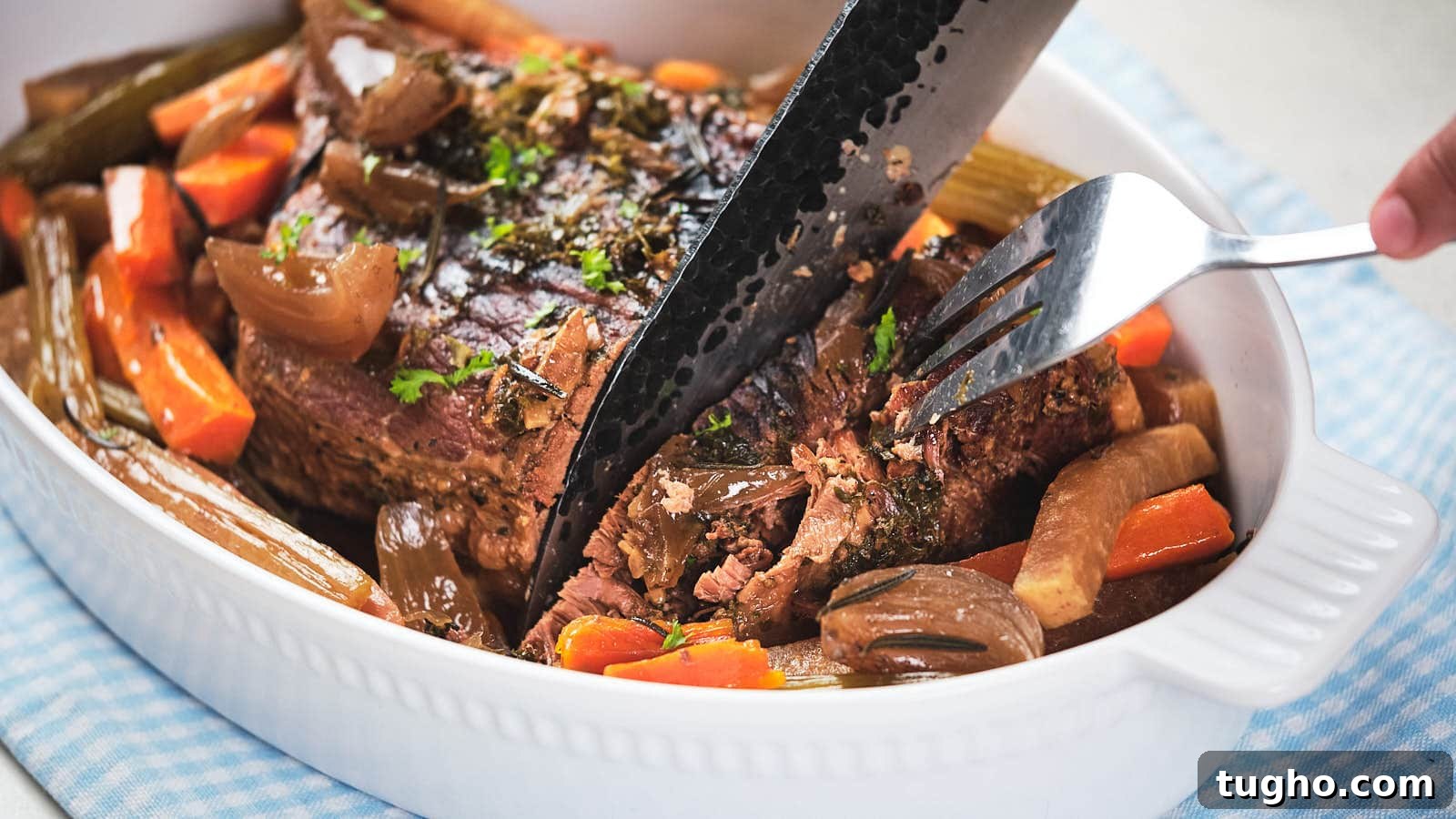 17 No-Fuss Dinners That Make the Whole Family Smile 11 A picture of Slow Cooker Pot Roast with carrot and parsnip.